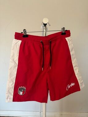 Red Athletic Shorts with White Side Panels